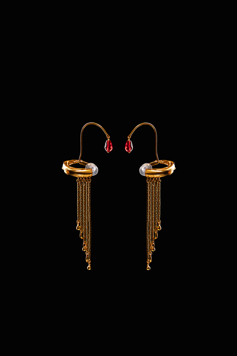 Embrace Earclip in sterling silver, product photo on black – ear clips, Bhavya Ramesh