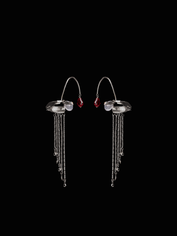 Embrace Earclip in sterling silver, product photo on black – ear clips, Bhavya Ramesh