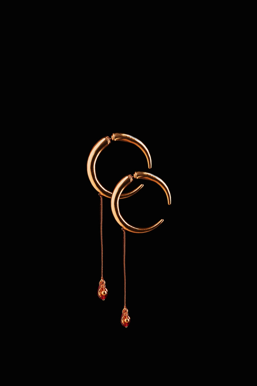 Omen Earrings in sterling silver, product photo on black – earrings, Bhavya Ramesh