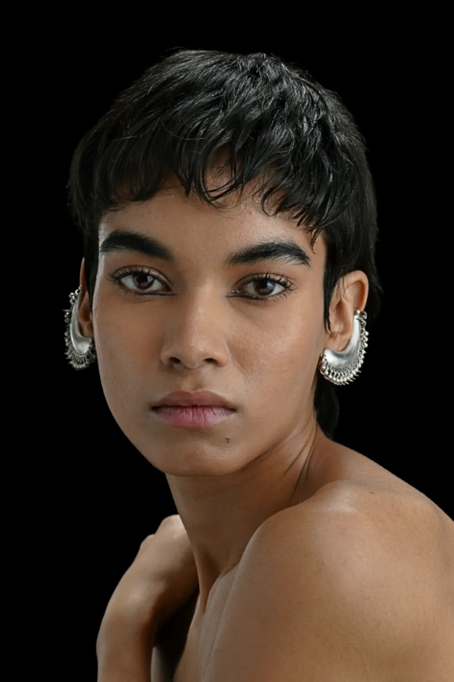 Tusk Earclips in sterling silver, worn by a model – ear clips, Bhavya Ramesh