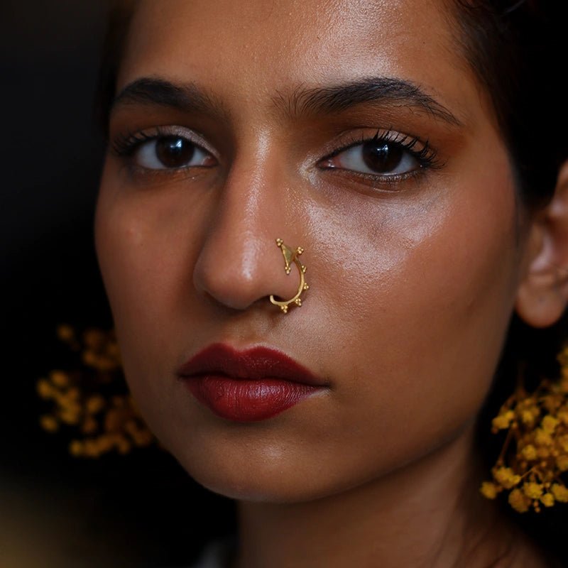 Arrow Nose Clip in 18-carat gold plating on sterling silver, worn by a model – nose pin, Bhavya Ramesh