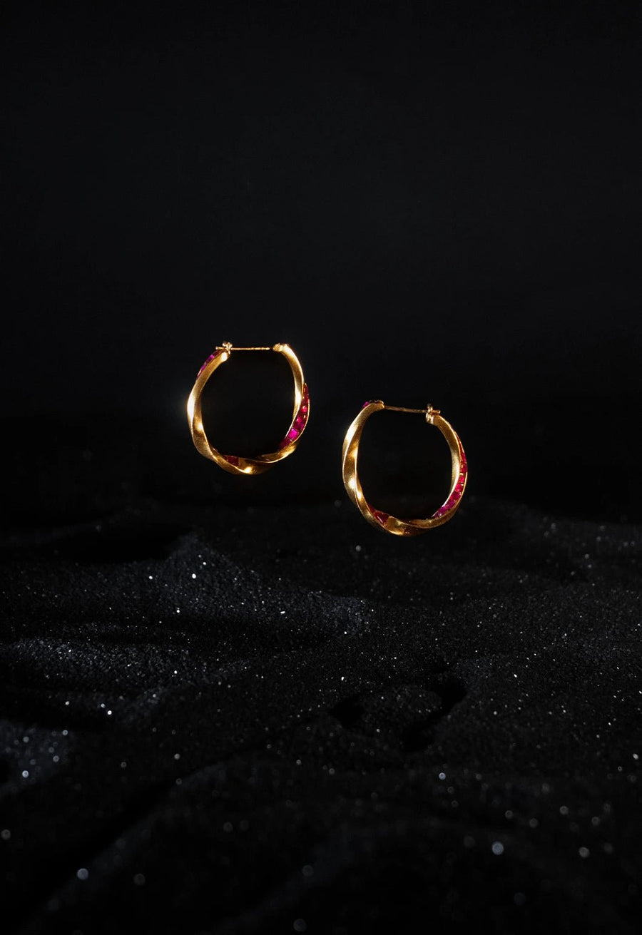 Astika Earring in 18-carat gold plating on sterling silver, product photo on black – earrings, Bhavya Ramesh