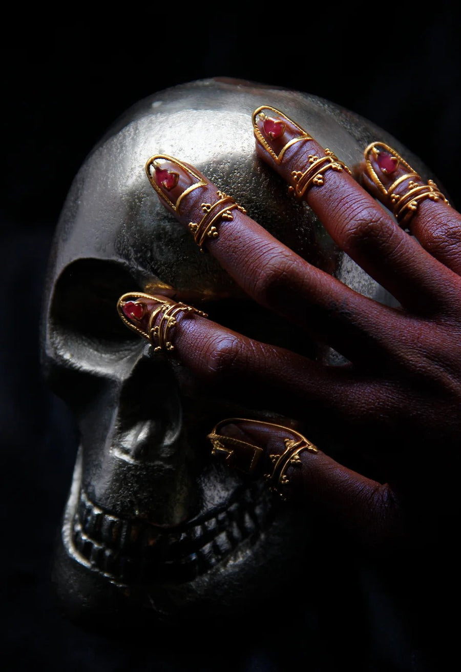 Dame in 18-carat gold plating on sterling silver, product photo on black – nail rings, Bhavya Ramesh
