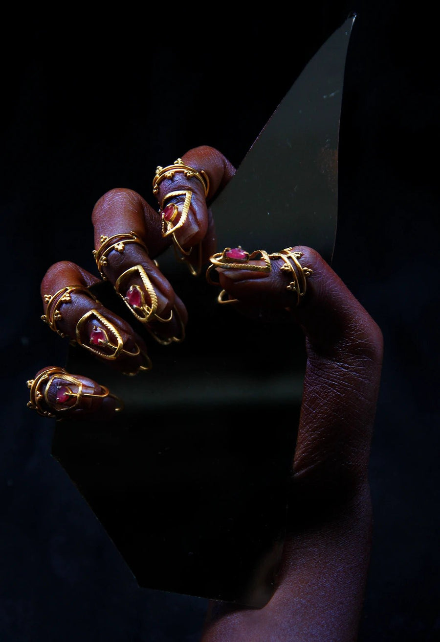 Dame in 18-carat gold plating on sterling silver, product photo on black – nail rings, Bhavya Ramesh