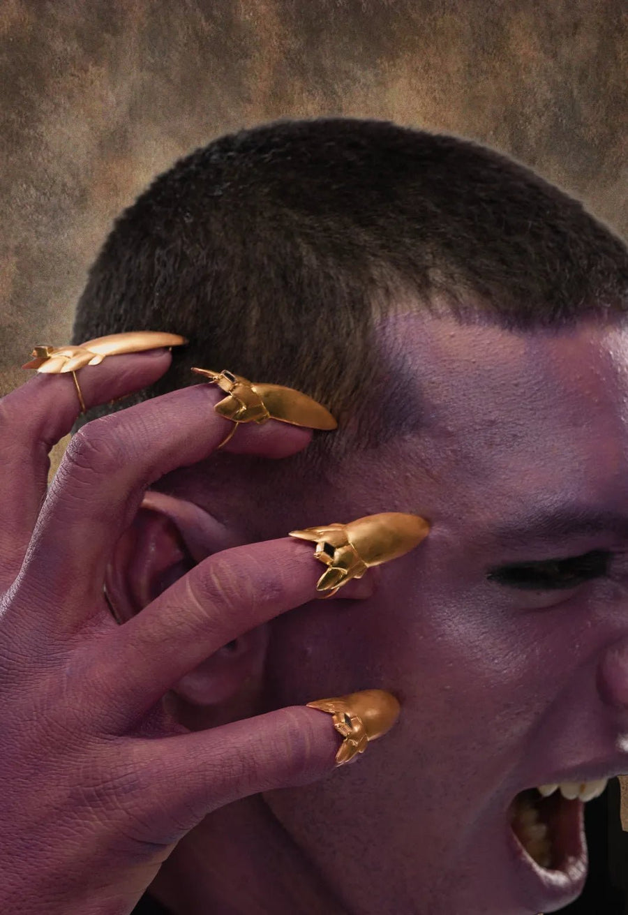 Devil Dagger Nail Ring in 18-carat gold plating on sterling silver, worn by a model – nail rings, Bhavya Ramesh