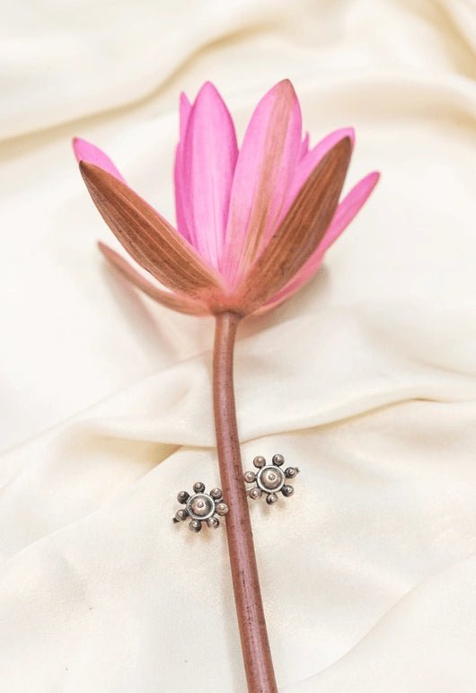 Flower Ear Clip in 925 sterling silver, worn by a model – ear clips, Bhavya Ramesh