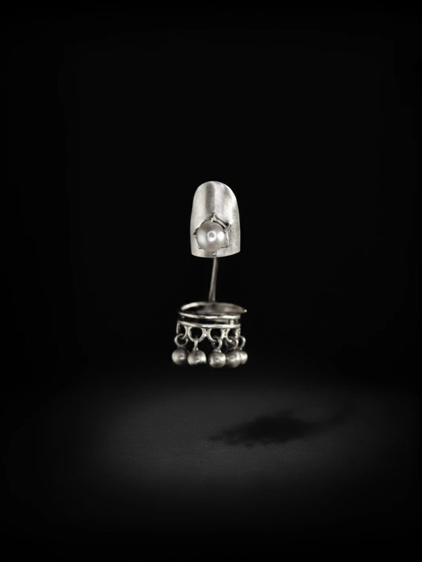 Pearlita in sterling silver, product photo on black – nail rings, Bhavya Ramesh