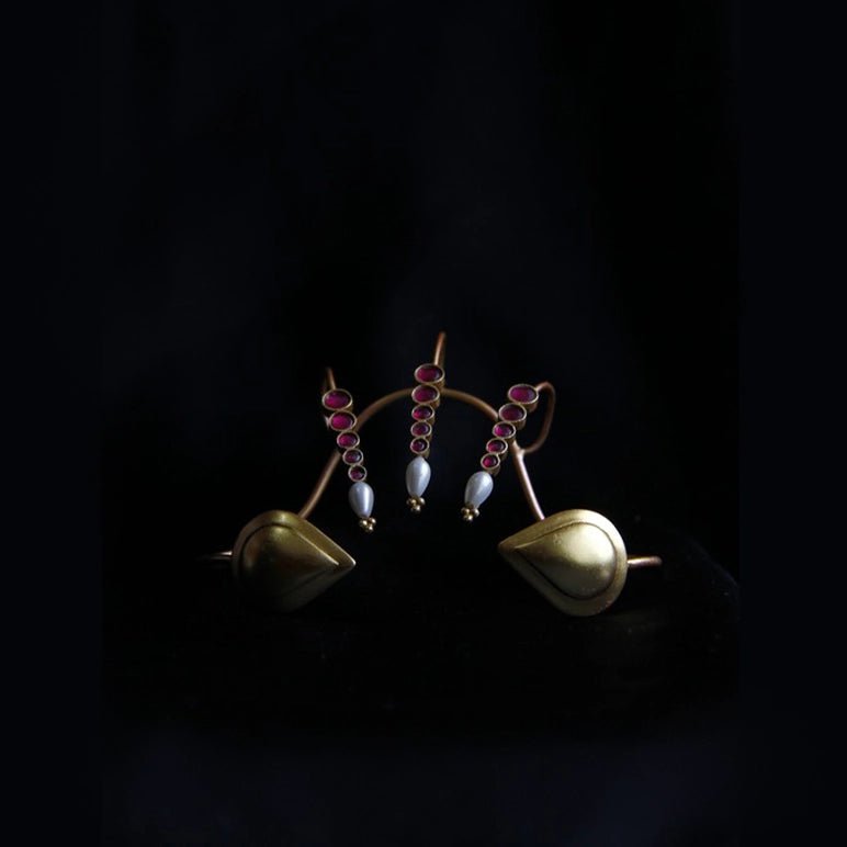 Her Highness Palm Cuff in 18-carat gold plating on sterling silver, product photo on black – palm cuff, Bhavya Ramesh