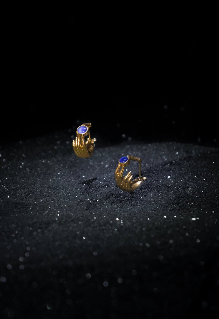 Hissvarna Earring in 18-carat gold plating on sterling silver, product photo on black – earrings, Bhavya Ramesh