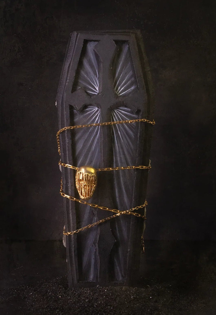 Iron grip neck piece in 18-carat gold plating on sterling silver, product photo on black – neck pieces, Bhavya Ramesh