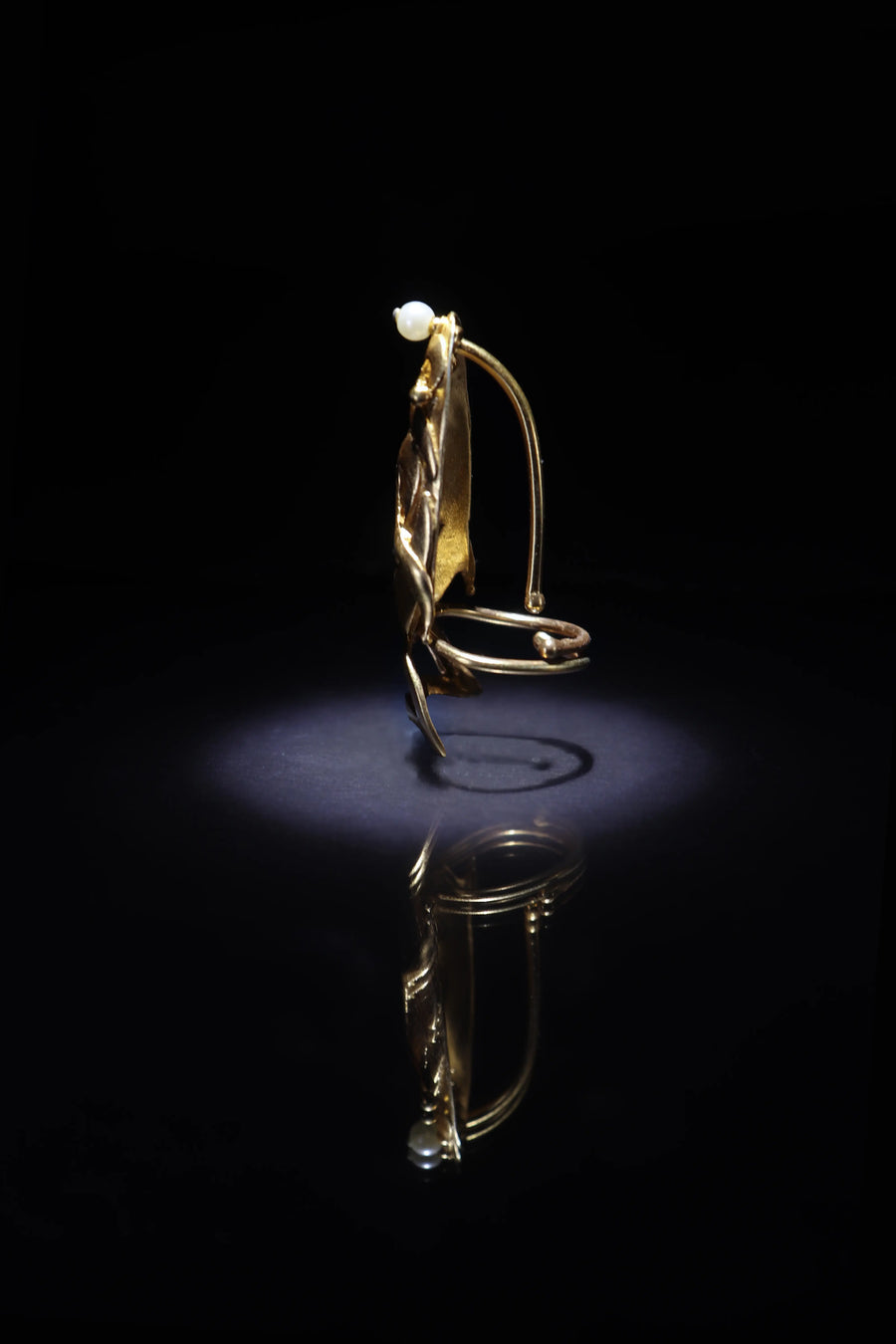 Jwala in 18-carat gold plating on sterling silver, product photo on black – nail rings, Bhavya Ramesh