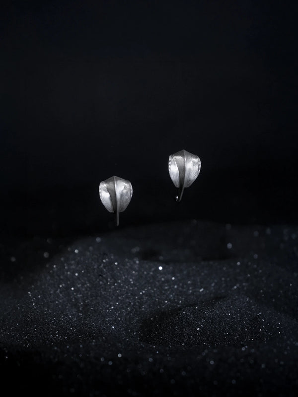Kadru Earring in 925 sterling silver, product photo on black – earrings, Bhavya Ramesh
