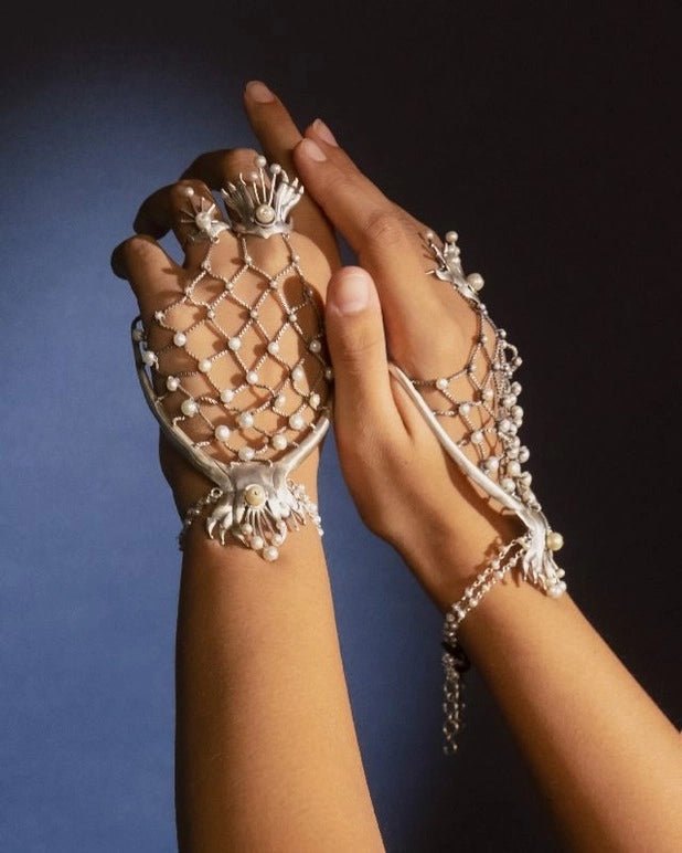 Kaju Katli in sterling silver, worn by a model – palm cuff, Bhavya Ramesh