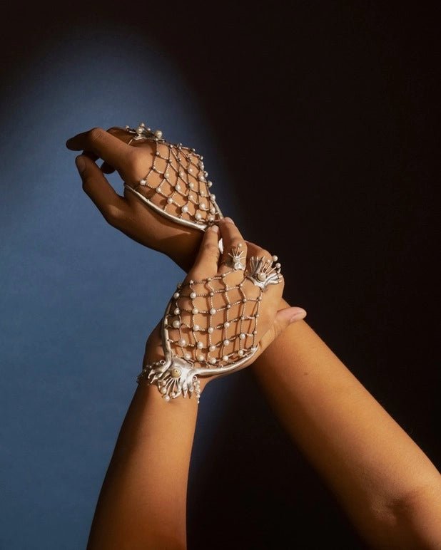 Kaju Katli in sterling silver, worn by a model – palm cuff, Bhavya Ramesh