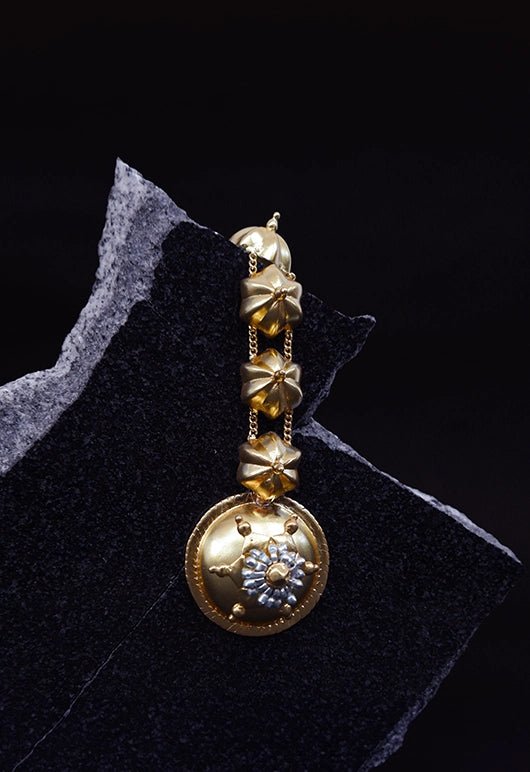 Levitate Maang Tika in 18-carat gold plating on sterling silver, product photo on black – maang tika, Bhavya Ramesh