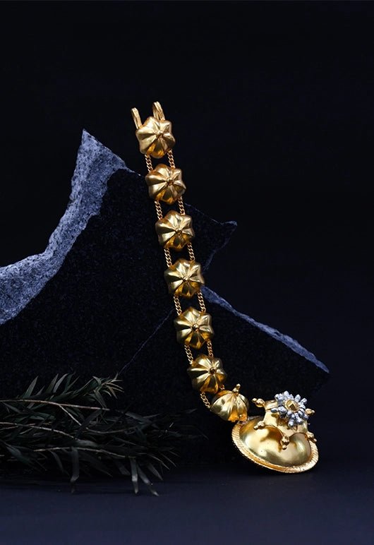 Levitate Maang Tika in 18-carat gold plating on sterling silver, product photo on black – maang tika, Bhavya Ramesh