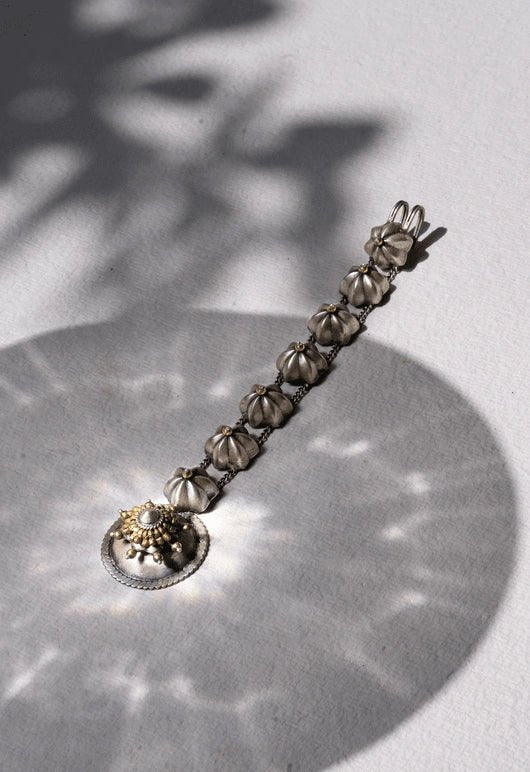 Levitate Maang Tika in 925 sterling silver, product photo on black – maang tika, Bhavya Ramesh