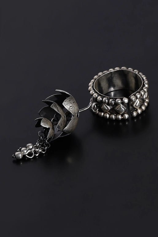 Lotus Ring in 925 sterling silver, product photo on black – rings, Bhavya Ramesh