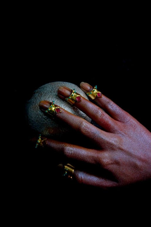 Maharani Nail Rings in 18-carat gold plating on sterling silver, product photo on black – nail rings, Bhavya Ramesh