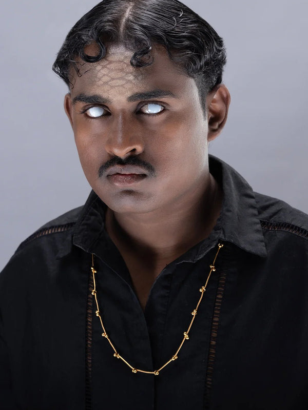 Mankashi Neckpiece in 18-carat gold plating on sterling silver, worn by a model – neck pieces, Bhavya Ramesh