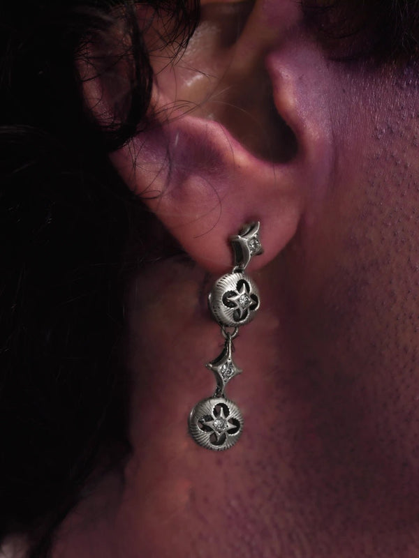 Oblivion Earring in 925 sterling silver, product photo on black – earrings, Bhavya Ramesh