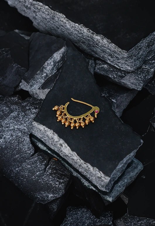 Peacock Nath in 18-carat gold plating on sterling silver, product photo on black – nose pin, Bhavya Ramesh