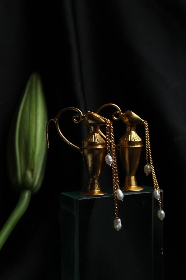 Pour Earrings in 18-carat gold plating on sterling silver, product photo on black – earrings, Bhavya Ramesh
