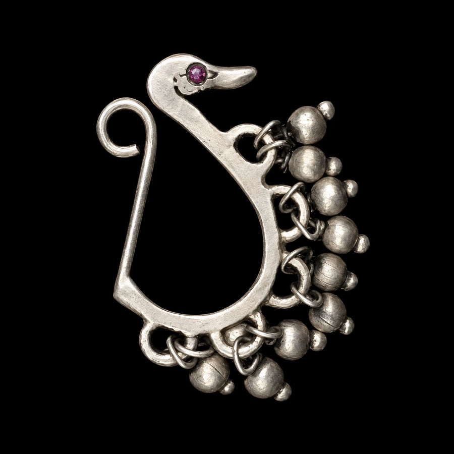Preen Nose Pin in 925 sterling silver, product photo on black – nose pin, Bhavya Ramesh