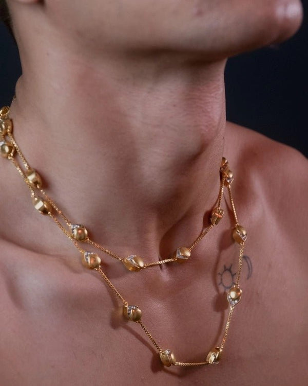Rasmalai Long Neckdrips in 18-carat gold plating on sterling silver, worn by a model – neck pieces, Bhavya Ramesh