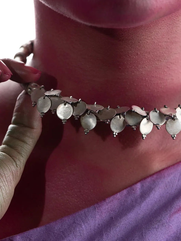 ShimmerShield in 925 sterling silver, product photo on black – neck pieces, Bhavya Ramesh