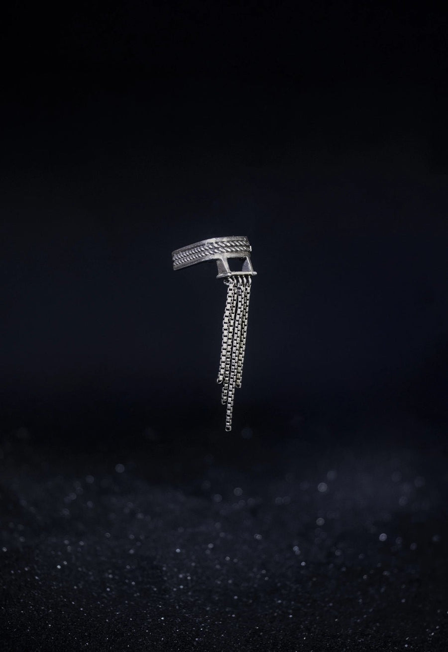 Slinther Ear clips in 925 sterling silver, product photo on black – ear clips, Bhavya Ramesh