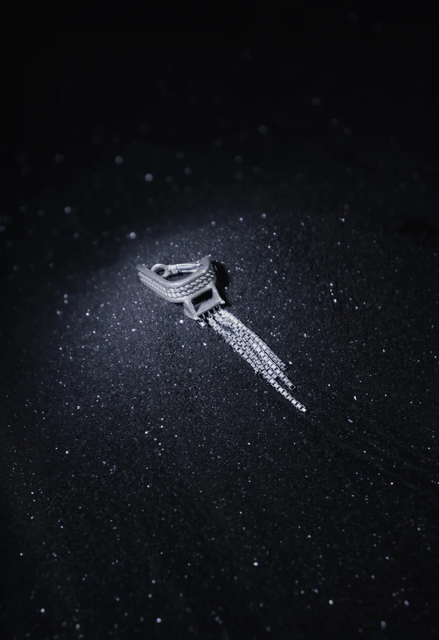Slinther Ear clips in 925 sterling silver, product photo on black – ear clips, Bhavya Ramesh