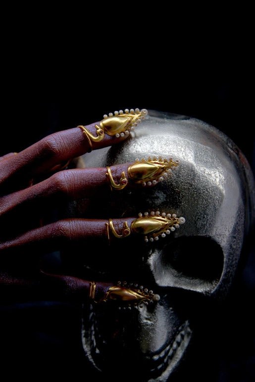 Sovereign in 18-carat gold plating on sterling silver, product photo on black – nail rings, Bhavya Ramesh