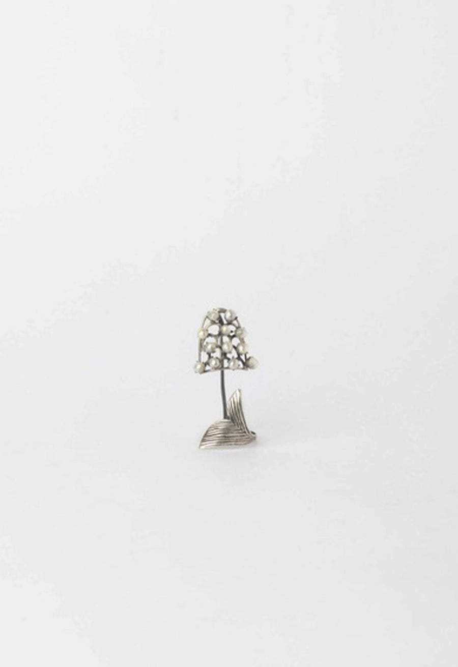 The Pearler in 925 sterling silver, product photo on black – nail rings, Bhavya Ramesh