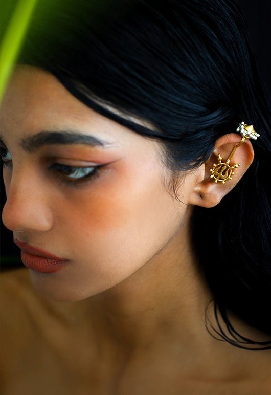 Trishul Ear Clip in 18-carat gold plating on sterling silver, worn by a model – ear clips, Bhavya Ramesh