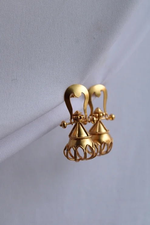Trishul Jhumka in 18-carat gold plating on sterling silver, product photo on black – earrings, Bhavya Ramesh