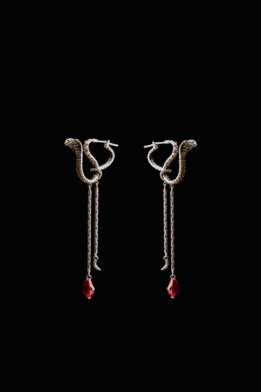 Ward Earrings in sterling silver, product photo on black – earrings, Bhavya Ramesh