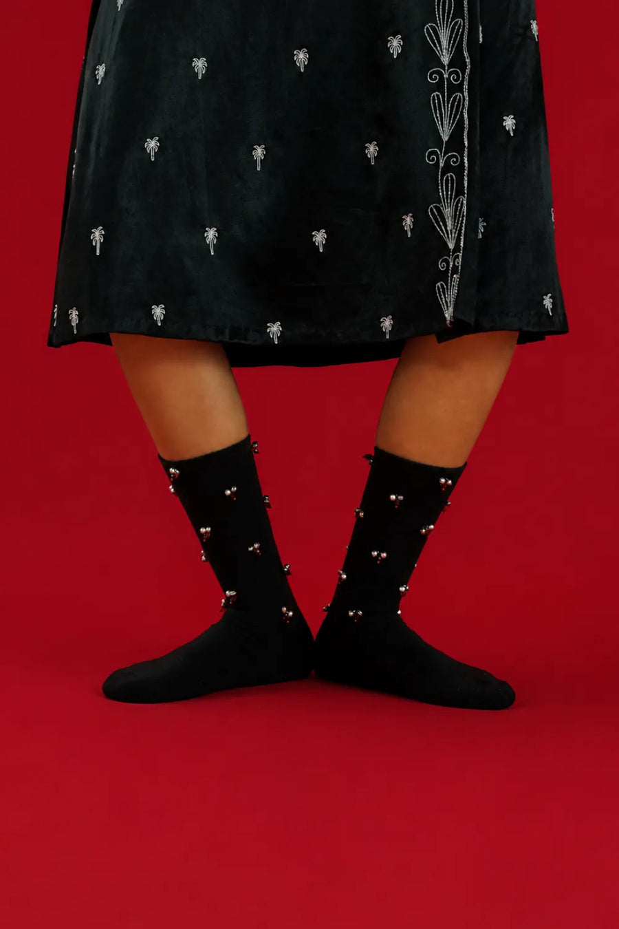 Ghungroo Socks in sterling silver, product photo on black – socks, Bhavya Ramesh