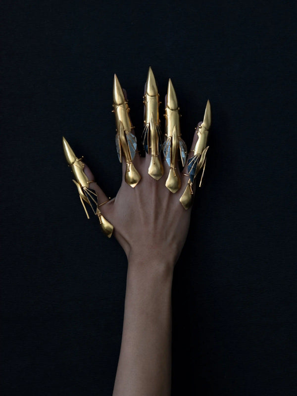 Man Eater in 18-carat gold plating on sterling silver, product photo on black – rings, Bhavya Ramesh