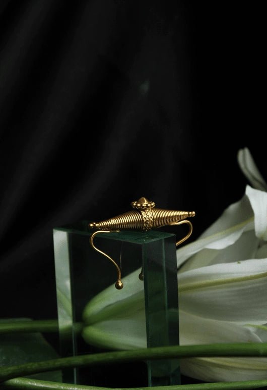 Boho Ear Clip in 18-carat gold plating on sterling silver, product photo on black – ear clips, Bhavya Ramesh