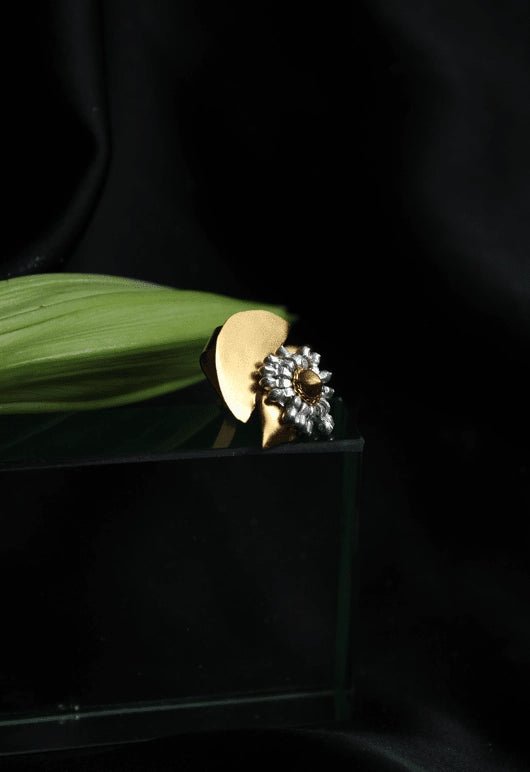 Axe Ear Clip in 18-carat gold plating on sterling silver, product photo on black – ear clips, Bhavya Ramesh