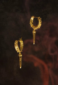 Boucle d'oreille angoissée