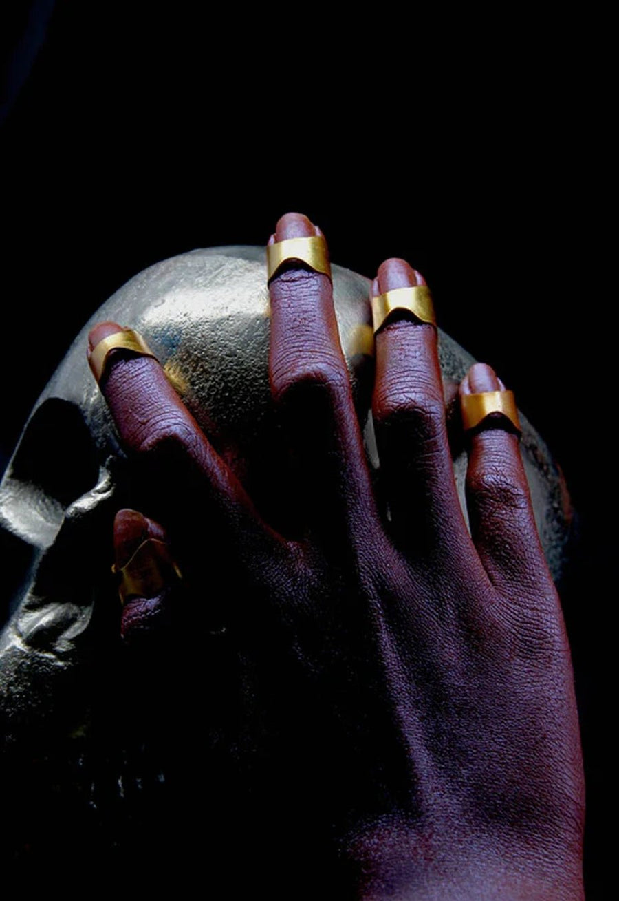 Armour Nail Rings in 18-carat gold plating on sterling silver, product photo on black – nail rings, Bhavya Ramesh