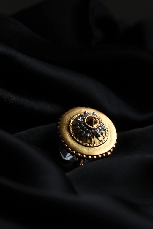 Banjara Ring in 18-carat gold plating on sterling silver, product photo on black – rings, Bhavya Ramesh