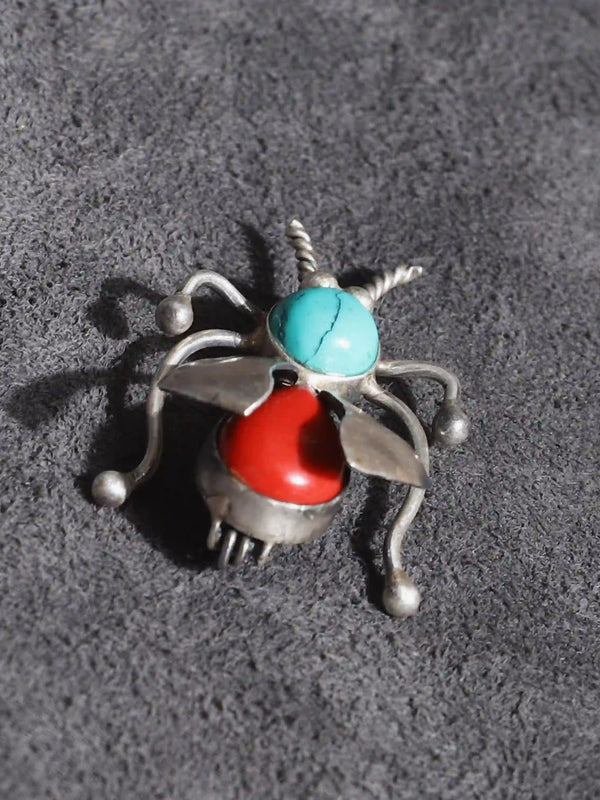 Bug Brooch in 925 sterling silver, product photo on black – brooch, Bhavya Ramesh