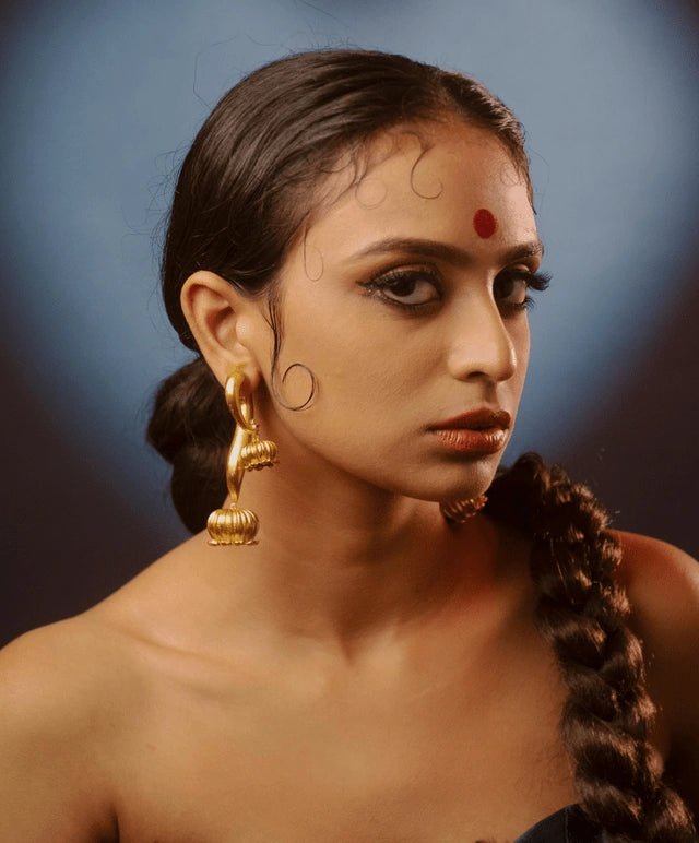 Cham Cham in 18-carat gold plating on sterling silver, worn by a model – earrings, Bhavya Ramesh