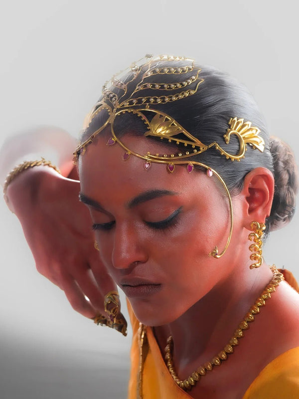 Chariot Of The Gods in 18-carat gold plating on sterling silver, worn by a model – hair harness, maangtika, Bhavya Ramesh