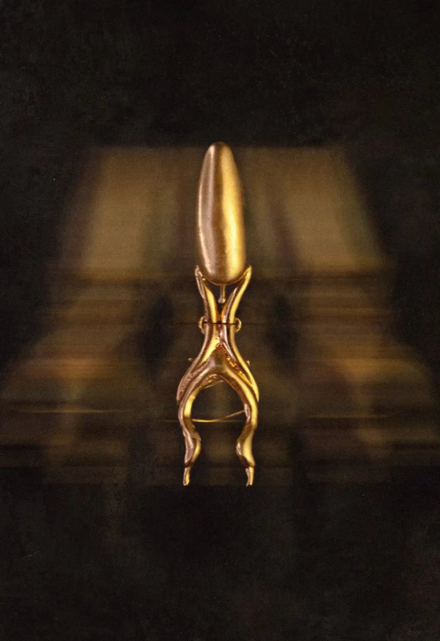 Clawthron Nail ring in 18-carat gold plating on sterling silver, worn by a model – nail rings, Bhavya Ramesh