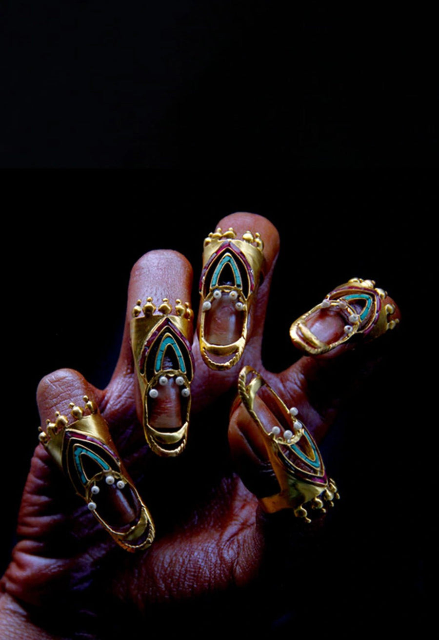 Cleo in 18-carat gold plating on sterling silver, product photo on black – nail rings, Bhavya Ramesh