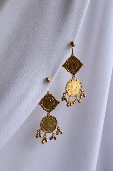 Cosmic Avalanche earring in 18-carat gold plating on sterling silver, product photo on black – earrings, Bhavya Ramesh